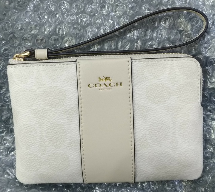 COACH 腰封老花 單層小手拿 冰川白
