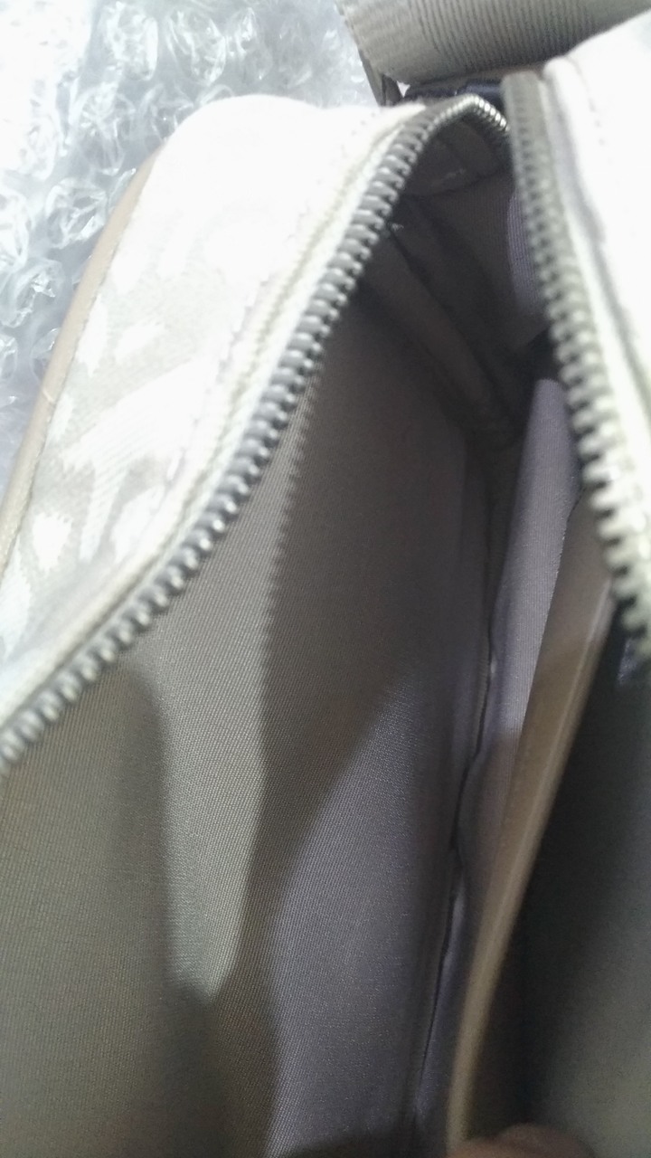 CK Calvin Klein 滿版ck刺繡小相機包